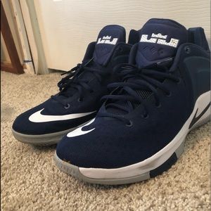 Blue and white Nike lebron Zoom witness shoes.
